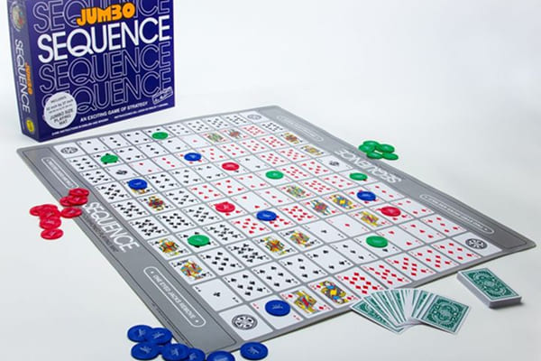 Sequence board with chips placed on card grid